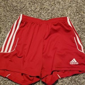 Red Adidas athletic shorts